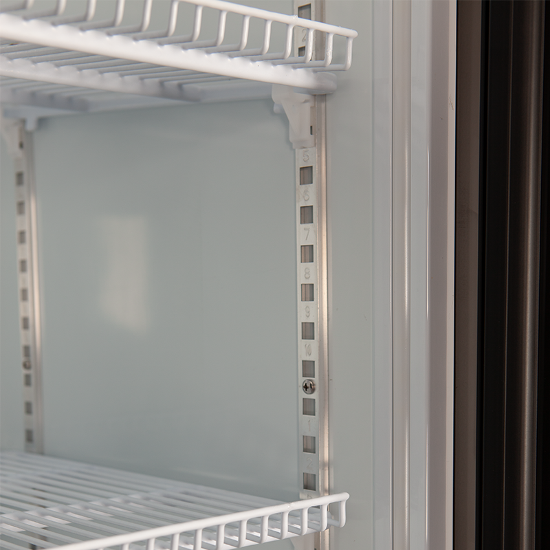 The shelf supports inside the beverage refrigerator